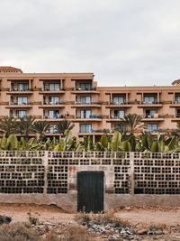 Exterior of residential building against sky