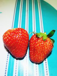 High angle view of strawberries on table