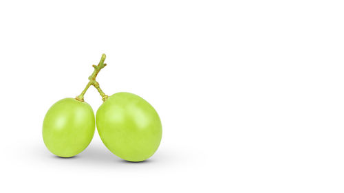 Close-up of fruits against white background