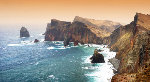 Scenic view of sea against clear sky