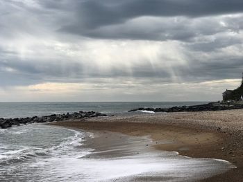 Scenic view of beach against sky