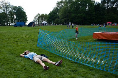 People relaxing in park