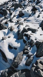 Aerial view of snow covered rocks