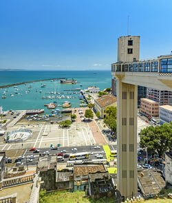 View of the bay of all saints with boats and lacerda elevator in the city of salvador in bahia