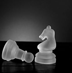 Close-up of chess pieces against the background