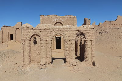 Old building against blue sky
