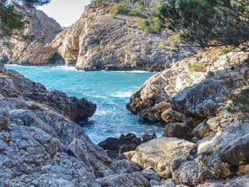 Scenic view of rocks in sea