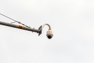 Low angle view of street light against sky