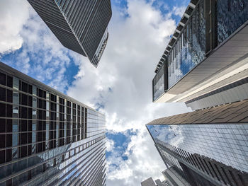 Low angle view of modern buildings against sky