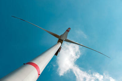 Low angle view of wind turbine against sky