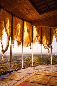 Scenic view of beach against sky during sunset