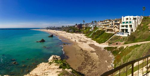 Scenic view of sea against blue sky