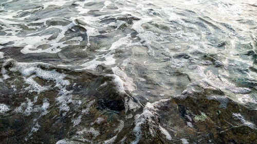 High angle view of rocks in sea