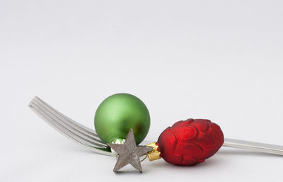 Close-up of fruits against white background