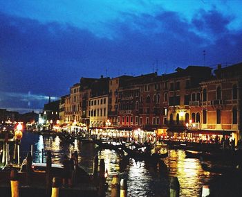 Reflection of illuminated buildings in water at night