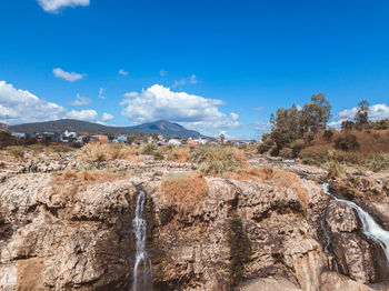 Scenic view of rocky mountains against sky