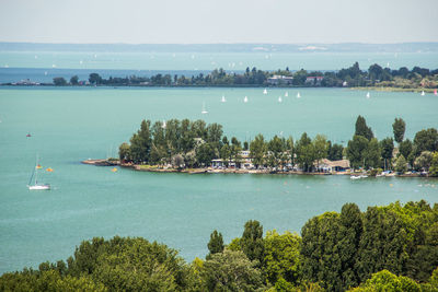 Scenic view of bay against sky