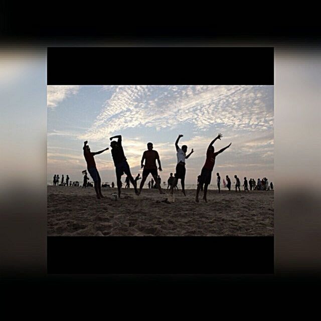 men, lifestyles, leisure activity, silhouette, sky, person, sunset, indoors, standing, full length, sea, togetherness, water, walking, medium group of people, horizon over water, cloud - sky, railing