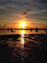 Scenic view of sea at sunset