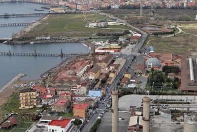 High angle view of river amidst buildings in city