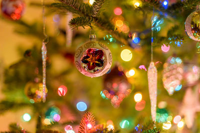 Close-up of christmas decoration hanging on tree