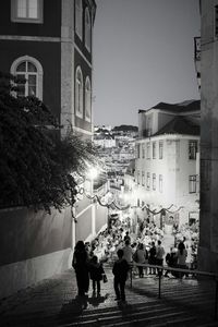 People walking on street in city