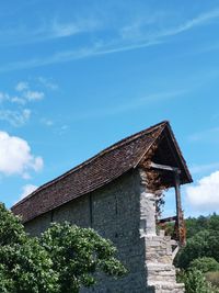 Low angle view of old building against sky