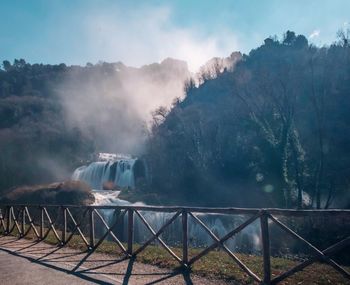 Beautiful marmore falls seen from roadside against sky