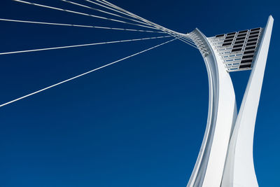 Low angle view of building against clear blue sky