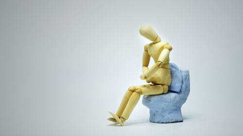 Close-up of stuffed toy against white background