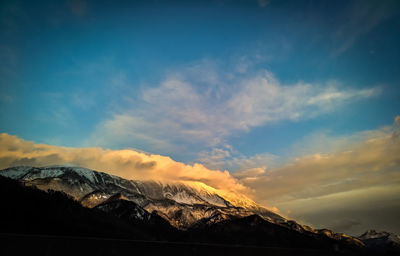 Scenic view of mountains against sky during winter