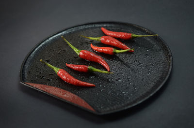 High angle view of red chili on table