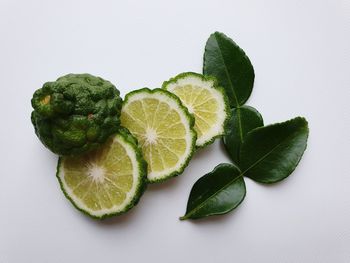 Close-up of fruits against white background