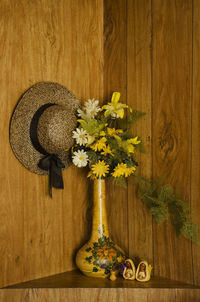 Close-up of flower pot on wooden table