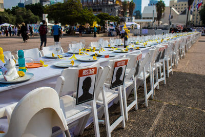 Empty chairs and tables in restaurant