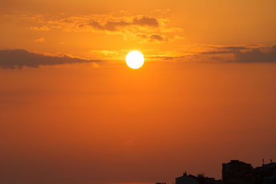 Scenic view of silhouette landscape against romantic sky at sunset