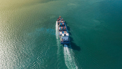 High angle view of ship sailing on sea