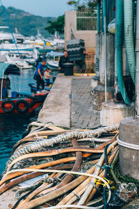 Boats moored at harbor