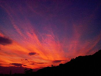 Scenic view of mountains at sunset