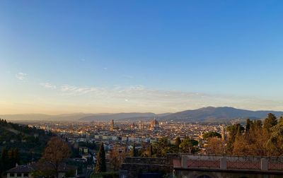 High angle view of townscape against sky at sunset