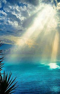 Scenic view of sea against blue sky