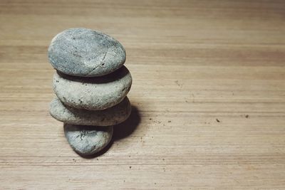 High angle view of stone on table