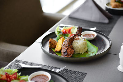 Close-up of food in plate on table