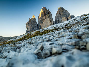 Low angle view of tre cime di lavaredo against sky