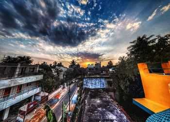 Panoramic view of city against sky at sunset