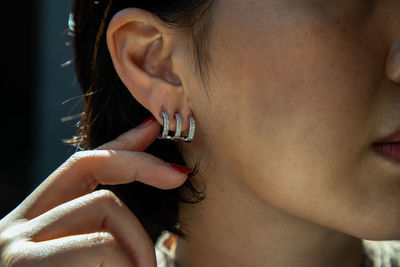 Close-up of young woman smoking cigarette