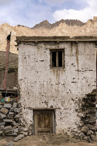 Window on mountain against sky