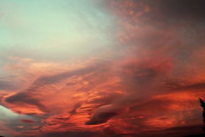 Scenic view of dramatic sky during sunset