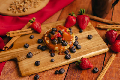 High angle view of strawberries on table