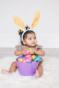 High angle view of cute baby girl in bathtub